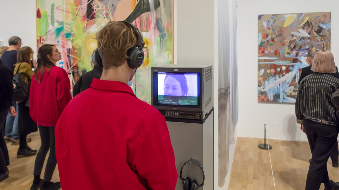 A man listens to an audio artwork in the Whitechapel Gallery exhibition 