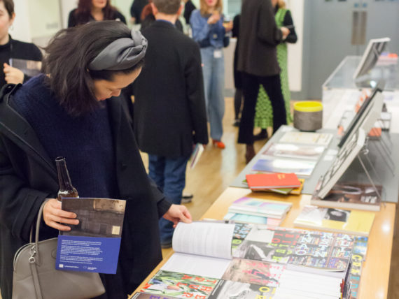 Guests perusing the Documents of Contemporary Art