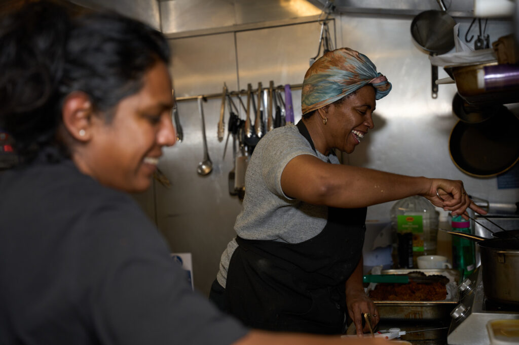 Two women cooking